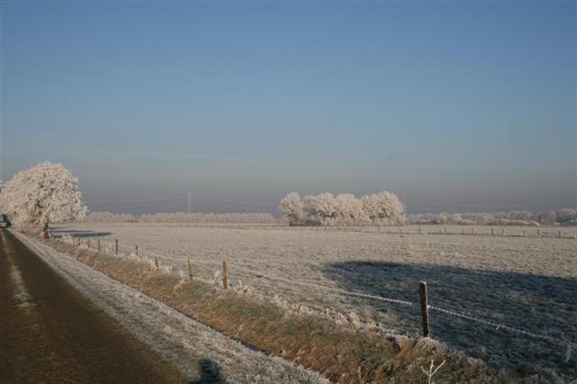 De Landerij verscholen in de verte.